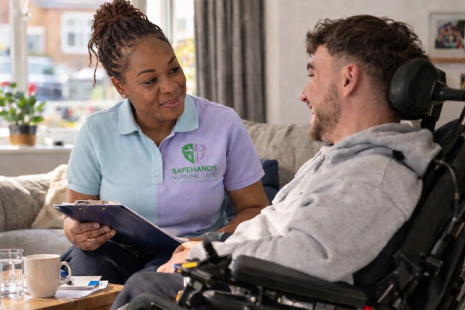Safehands nurse completing a home consultation with an adult client